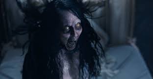 The Exorcism of God, movie. Frigthened woman with black hair yelling. 