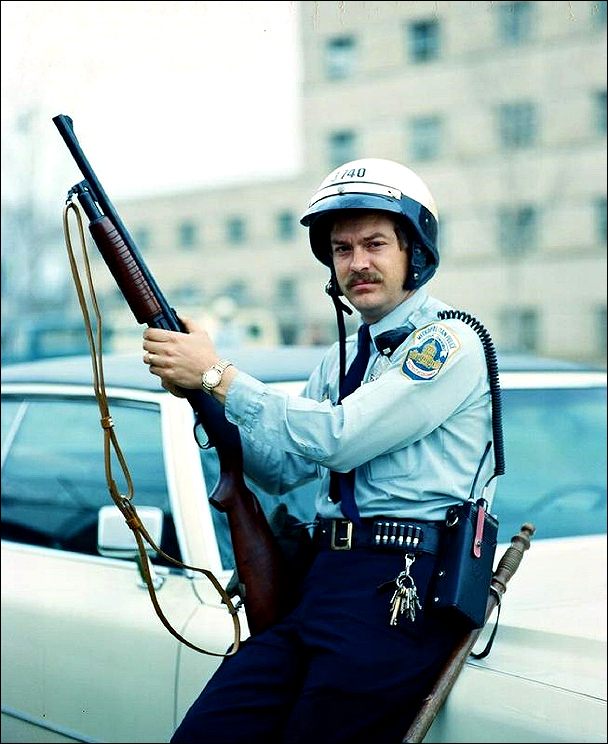 Hearing Voices in Your Head: Mental Illness and Hallucinations or Gods and Demons? Police officer with gun.