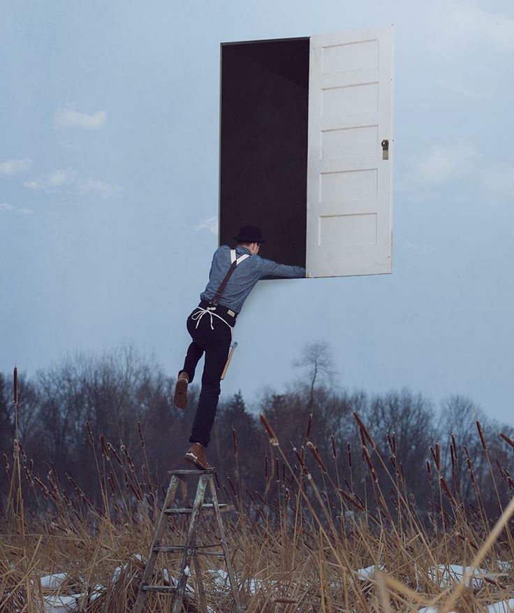 A man climbing the ladder and opening the door of the fabric of reality.